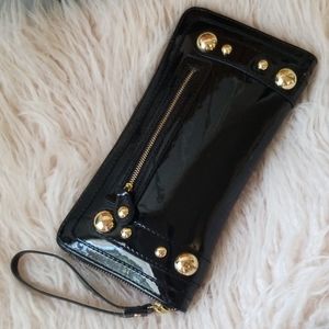 Armani exchange wristlet black and gold.